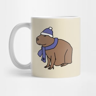 Winter Capybara Wearing Blue Hat and Scarf Mug